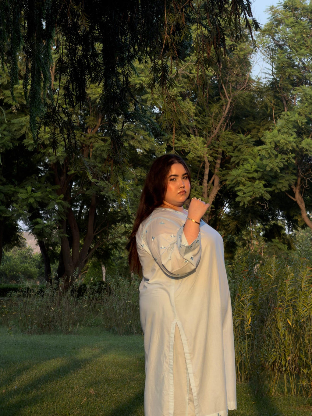 Full length view of the Ice Blue Embroidered kurta set showing the sheer embroidered sleeves